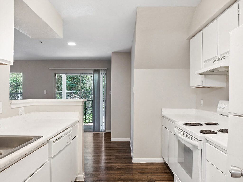 Kitchen with oven at Park Village Apartments in Conroe TX